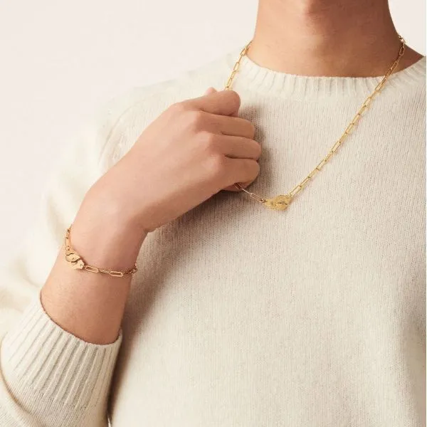 collier-menottes-dinh-van-r12-en-or-jaune(2)_dd2d94d2-43a7-48a9-b51b-552bf28556ec.png