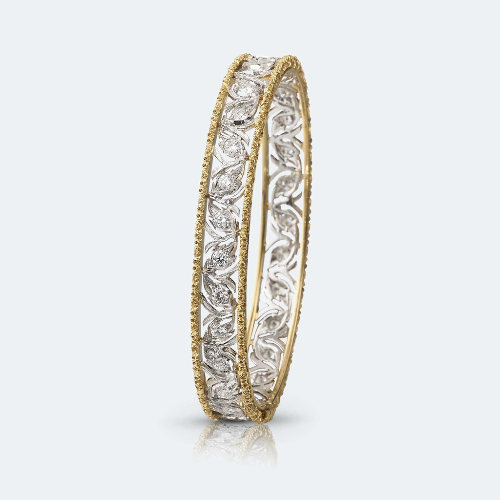 bracelet ramage in white and yellow gold with diamonds