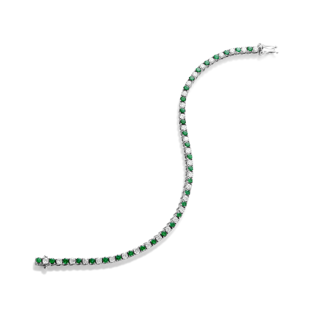 Tennis bracelet with diamonds and emeralds