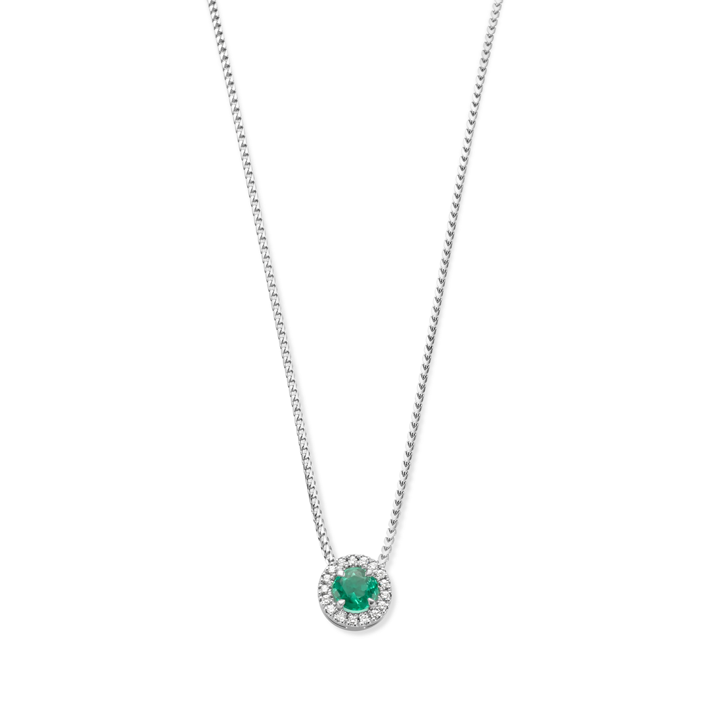 White gold pendant with emerald and diamonds