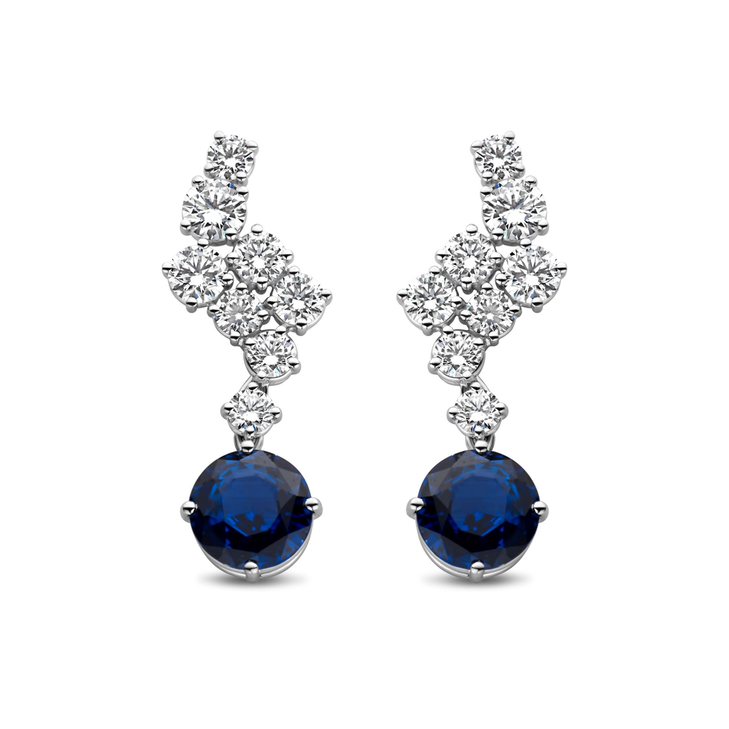Whitegold dangling earrings with diamonds and saphire