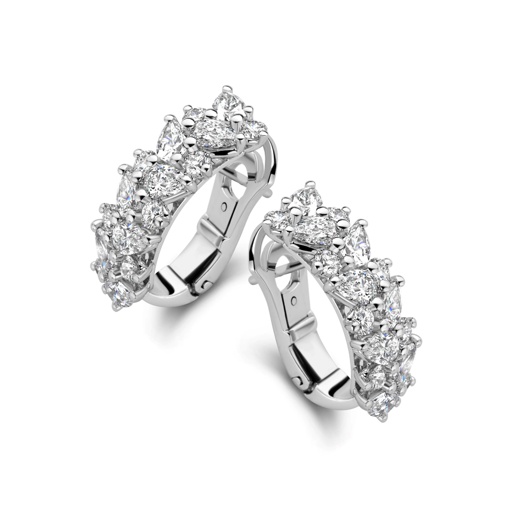 White gold ear clips with pear shape & brilliant cut diamonds
