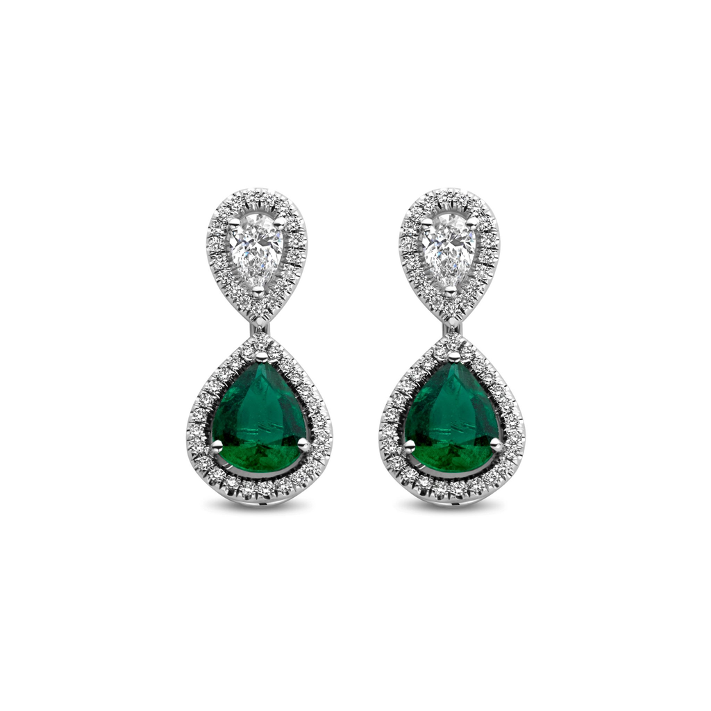 Whitegold earrings with pearshape diamonds and emeralds