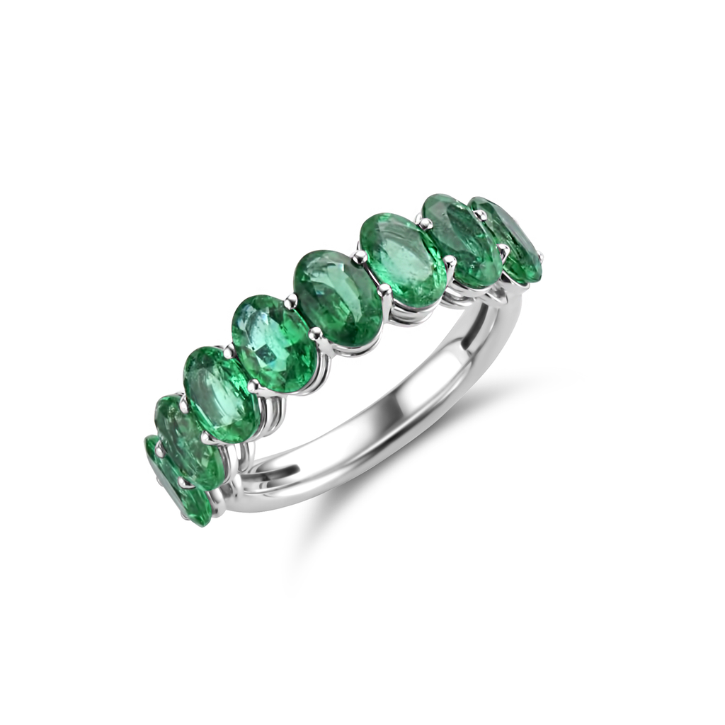 Ring with oval emeralds