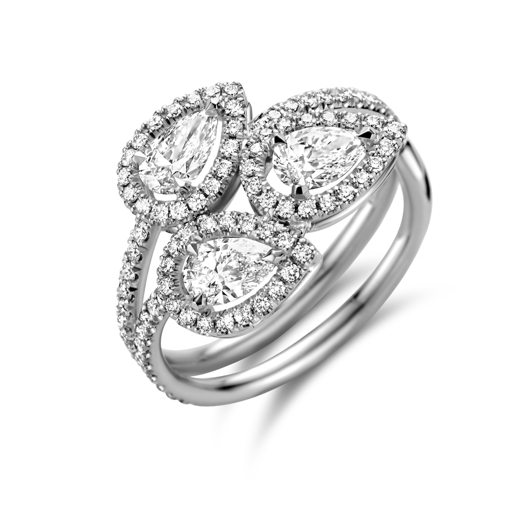 Ring Platina set with 3 Pear Shape Diamonds and Brillant