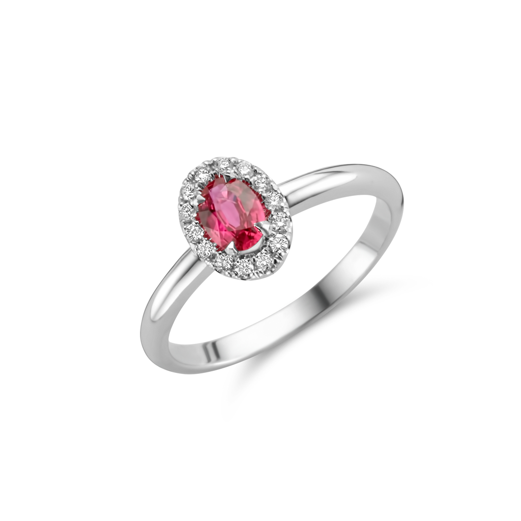 White gold ring with oval cut ruby and brilliants