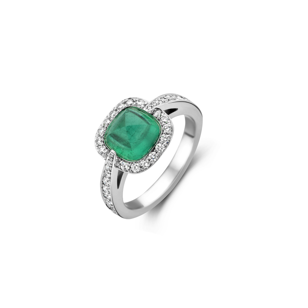 White gold ring with emerald and diamonds