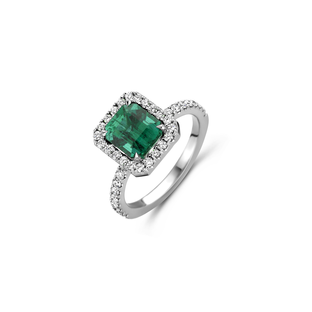 White gold ring with emerald and diamonds