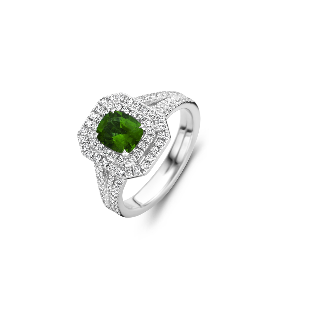 White gold ring with emerald and diamonds