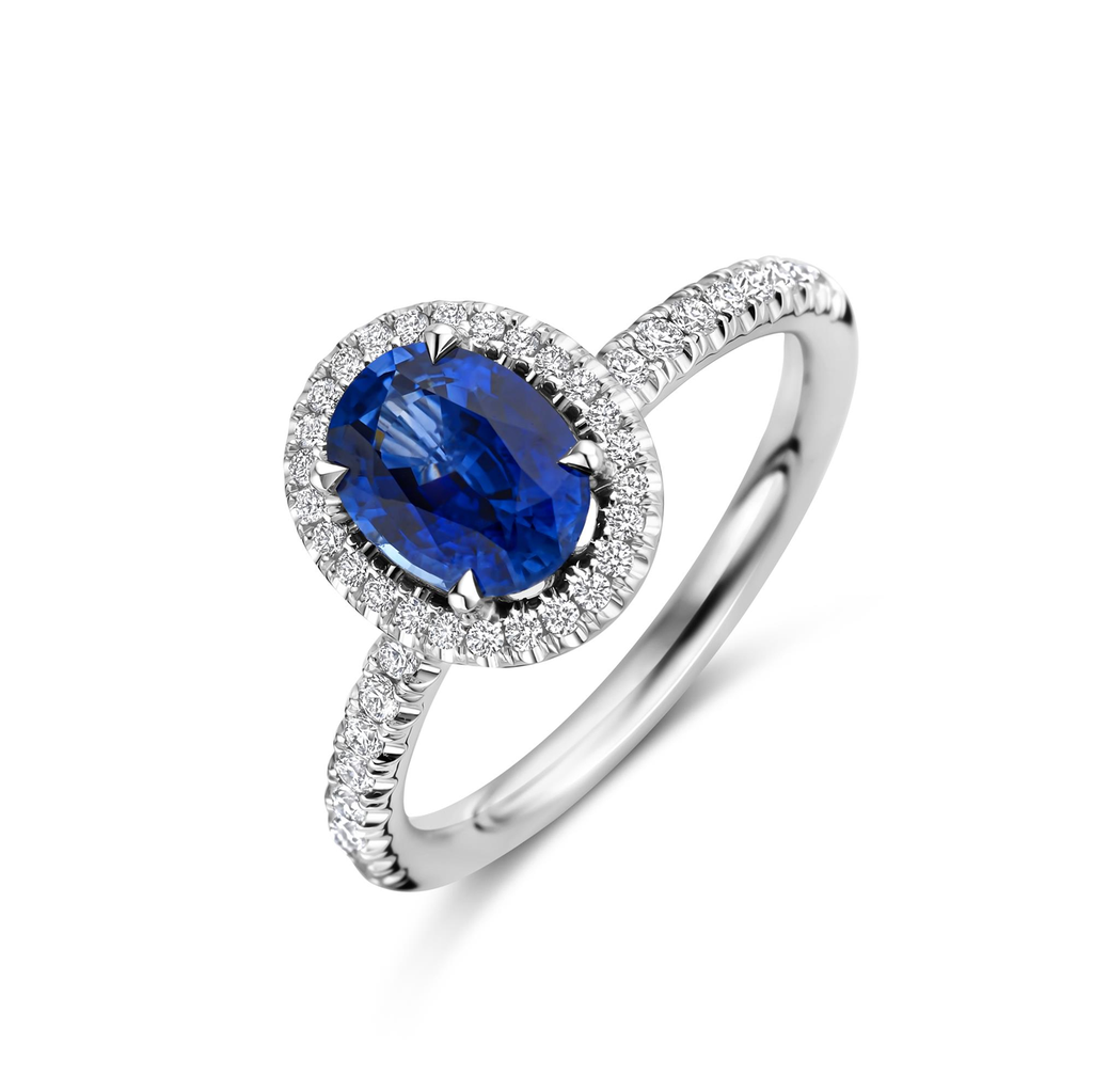 White gold ring with sapphire and diamonds