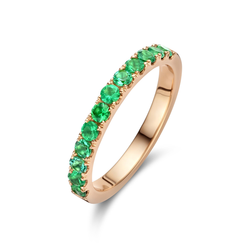 Wedding band with emeralds